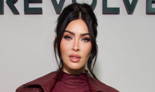 Pregnant Megan Fox flaunts  her bump in sheer dress as she prepares to welcome first child with rapper MGK (Photos)